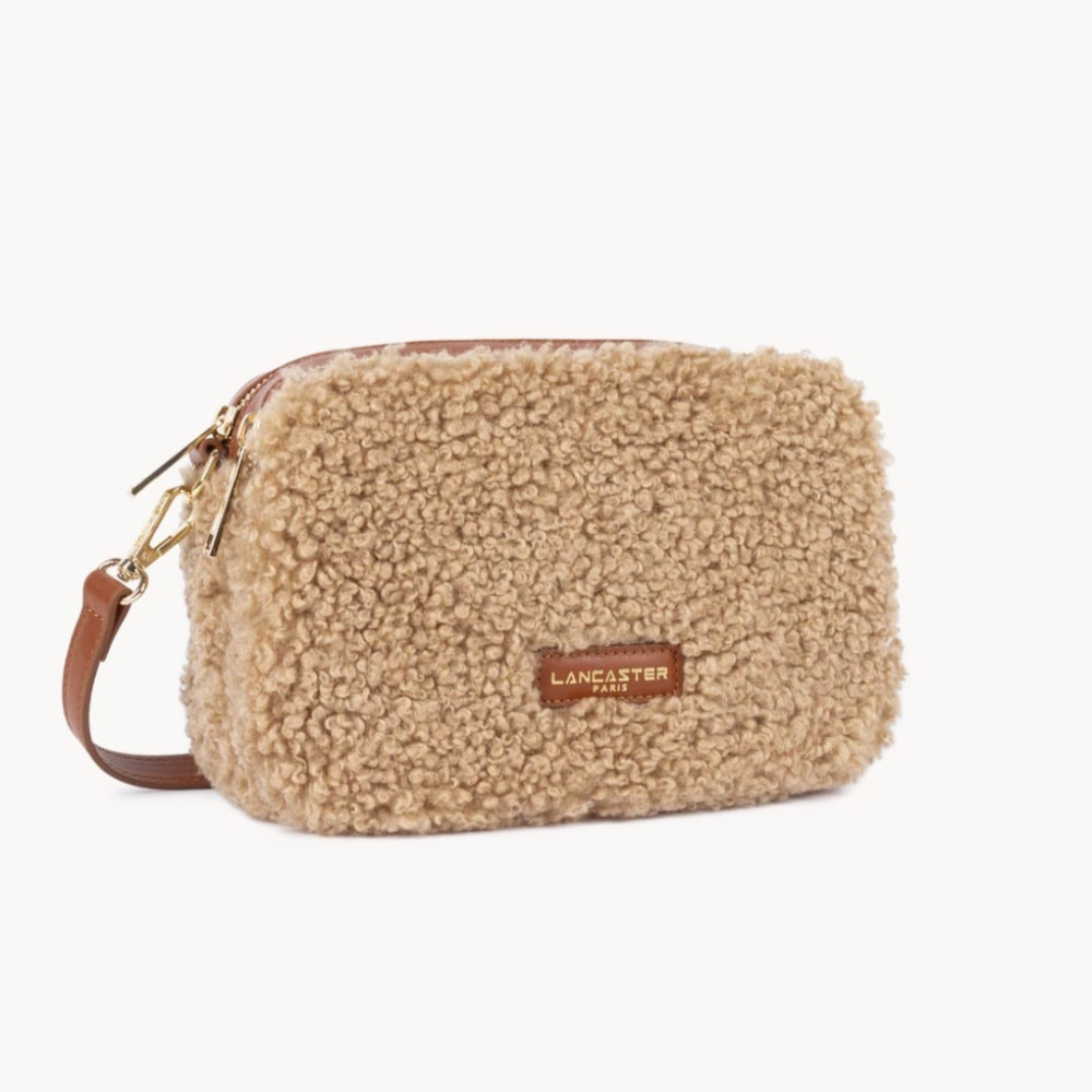 SAC TROTTEUR MOUMOUTE 518-022 LANCASTER COGNAC VUE LATÉRALE SAC TROTTEUR MOUMOUTE 518-022 LANCASTER COGNAC VUE LATÉRALE